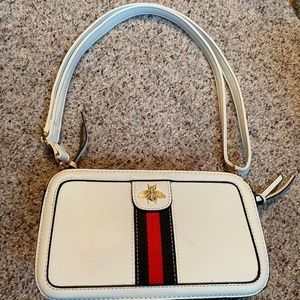 White striped bee symbol shoulder bag